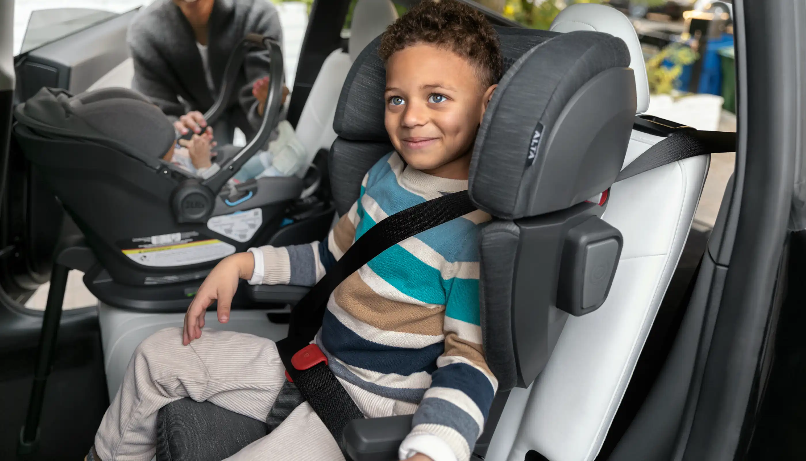 Child comfortably buckled into the car seat